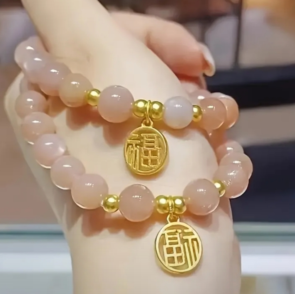 Rose Quartz Stretch Bracelet With The Fu Sign. NWT